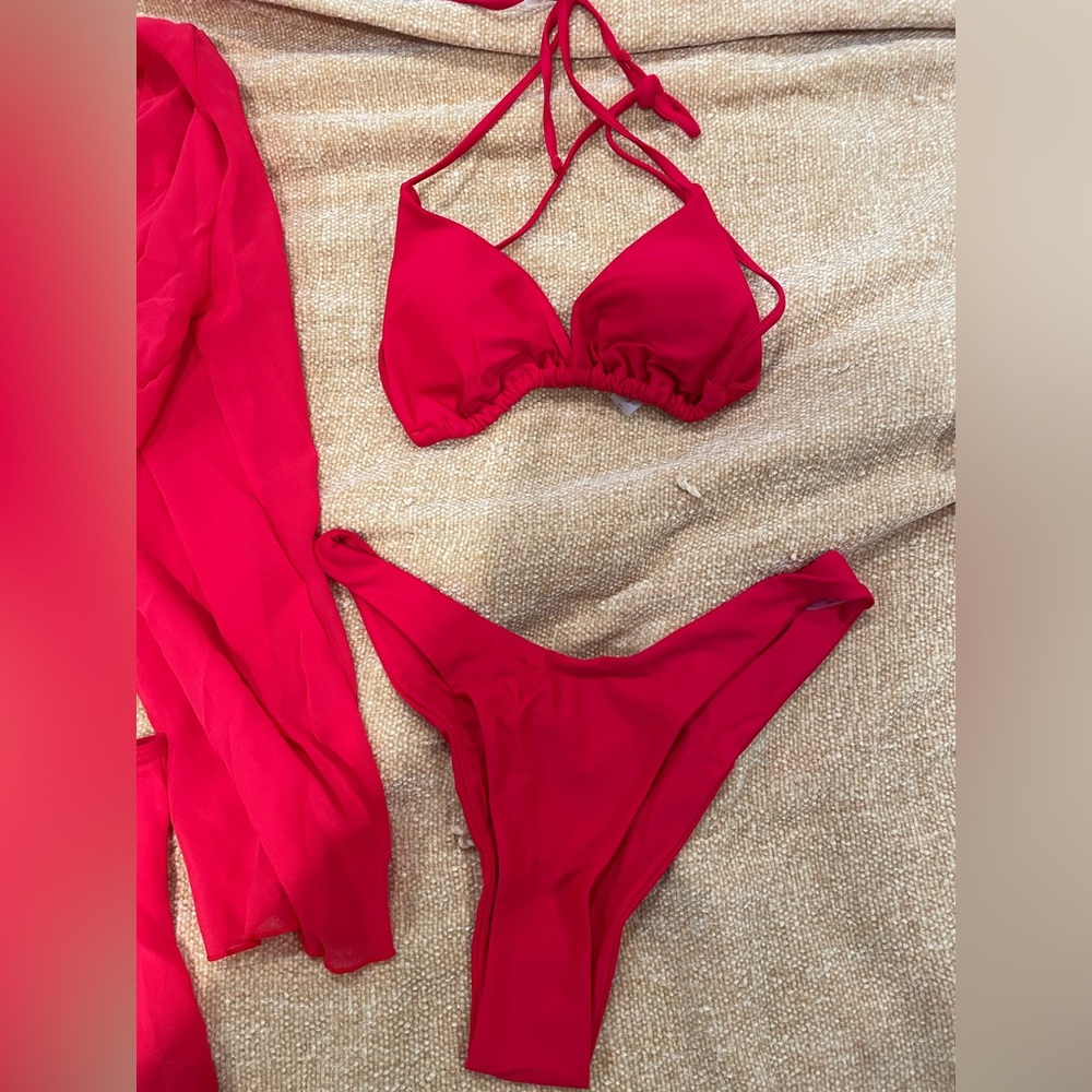 New red swimsuit w cover up (never used cause shein sent me 2 of them)
